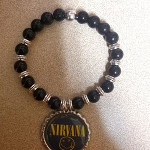 Nirvana bracelet agate imitation onyx black beads with silver accents stretch